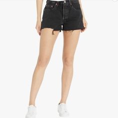 - Nwt - Ragged, Frayed Hemline Gives A Diy Cut-Off Look. - Original 501 Shorts Feature Classic Fit Through The Seat And Thigh. - On-Trend High Rise. - Five-Pocket Design With Signature Arcuate Stitch At Back. - Leather Brand Patch At Back Waist. - Belt-Loop Waistband. - Button Fly Closure. - 100% Cotton. - Machine Wash Cold And Tumble Dry Low. - Imported. Levi's Black Bottoms For Spring, Fitted Levi's Shorts, Levi's Black Summer Bottoms, Levi's Black Shorts For Spring, 501 Shorts, American Flag Sweater, Adidas Track Suit, White Denim Shorts, Denim Cutoff Shorts