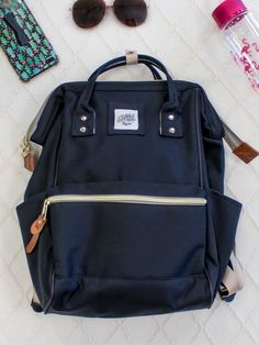 An everyday backpack that will keep you organized and ready for your next adventure. Accessible zippers and pockets to stuff with all your favorite items and one for snacks of course! Back-to-school Backpack With Zipper Pocket, Black Travel Backpack With Pockets, Daily Use Black Backpack With Zipper Pocket, Black Rectangular Backpack With Cell Phone Pocket, Black Backpack With Zipper Pocket For Outdoor Activities, Black Large Capacity Backpack For Everyday Use, Black Backpack For Everyday Use And Back To School, Large Capacity Black Backpack For Everyday Use, Black Backpack With Zipper Pocket For Outdoor