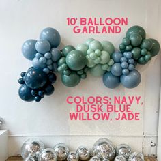 balloons are hanging on the wall in front of a sign that says colors navy, dusk blue, willow, jade