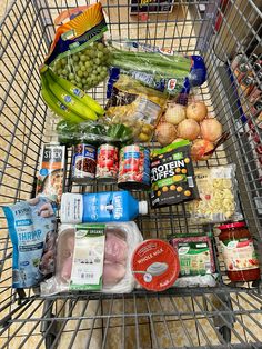 a shopping cart filled with food and drinks