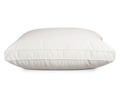 a white pillow on a white background with the pillows folded down to show it's filling