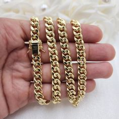 Stunning semi solid 14k yellow gold 7.5MM thick miami cuban chain. Perfect for everyday and every occasion. Sturdy, versatile, and everlasting. 14k gold will not tarnish or rust. Perfect gift. Materials: 14k gold Lenght: 22 inches, 24 inches Thickness: 7.5MM Weight: 35.1 grams, 39 grams (Aprox). 14k stamped Box lock Shipping with UPS,, a signature will be required. Briza Collections is a small family business that works hard on providing the best selection of Fine Solid Gold Jewelry for the best Luxury Yellow Gold Cuban Link Jewelry, Luxury Cuban Link Necklace With Solid Link Construction, Luxury 14k Gold Cuban Link Necklace With Box Chain, Yellow Gold Cuban Link Bracelet Box Chain As Gift, Gold Cuban Link Necklace In 14k Gold, Cuban Link Yellow Gold Box Chain Bracelet As Gift, 14k Yellow Gold Cuban Link Chain Bracelet, Luxury 14k Gold Cuban Link Necklace With Curb Chain, 14k Gold Cuban Link Necklace With Curb Chain