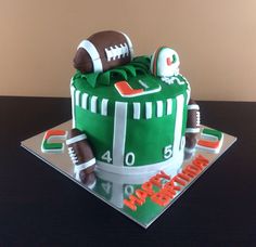 a football themed birthday cake on a table