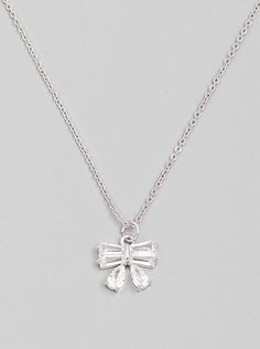 This elegant necklace features a silver chain with a sparkling crystal bow pendant, providing a subtle, yet eye-catching touch of style. Available in both the Fort Wayne and North Manchester boutique locations Don't forget! We're more than just a clothing boutique- we are a top-rated full-service florist operating in two locations. Need a floral delivery? Recently engaged? Or need flowers in a hurry? Check out our flowers tab for the full floral experience Bow Pendant, Bow Necklace, The Fort, Silver Bow, Elegant Necklace, Fort Wayne, In A Hurry, Elegant Necklaces, Disney Drawings