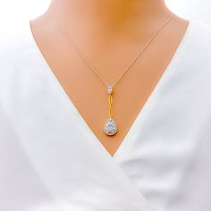 Exuding elegance, this 18k yellow gold set, weighing 7.0g, is a captivating ensemble. The pendant and matching 1.5" earrings showcase a combined 1.01ct of G-H colored, VS quality diamonds in round and baguette shapes. The alluring 1.5" pendant dangles gracefully, complemented by the earrings. Both are secured with screw back posts, making this set a statement of distinct sophistication. PRODUCT DETAILS Gold Purity(karat): 18k Item Weight(grams): 7.0 Item Finish: Yellow Gold Stone: Diamond Total Elegant Gold Diamond Necklace, Baguette Cut, Elegant Gold Diamond Necklace With Baguette Cut, Elegant Gold Baguette Cut Diamond Necklace, Baguette Cut Yellow Gold Diamond Necklace For Wedding, Baguette Cut Yellow Gold Diamond Wedding Necklace, Wedding Yellow Gold Baguette Cut Diamond Necklace, Formal Gold Diamond Necklace With Baguette Diamonds, Gold Cubic Zirconia Necklace With Baguette Cut, Gold Pear-shaped Diamond Necklace For Wedding