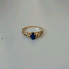 Beautiful, Simple Sapphire Ring In 10k Solid Gold. Size 7 In Excellent Condition With No Chips, Scratches, Or Signs Of Wear. Elegant Blue Sapphire Ring In 14k Gold, Blue 14k Gold Ring, Blue Birthstone Ring Stamped 14k As Gift, Blue 14k Gold Ring Stamped 14k, Blue 14k Stamped Ring Jewelry, Blue Sapphire Ring Stamped 14k For Gift, Blue Oval Jewelry Stamped 14k, Classic Blue Sapphire Ring Stamped 14k, Classic Blue Rings Stamped 14k