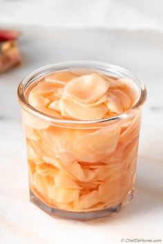 pickled ginger in a glass jar with text overlay