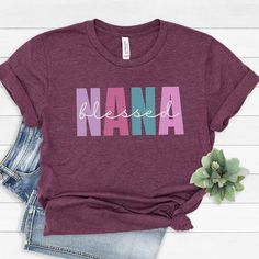 Cute Blessed Nana shirt for your favorite Grandma. Great T-Shirt gift for your Mom on Mother's Day. Gift for the future Nana or for the New Nana this year.  Our tees are printed DTG (direct to garment) on high-quality Bella + Canvas brand tees. These Bella+Canvas tees have that light and vintage feel. Our soft tees are perfect for wearing on their own and easy to dress up with a cardigan.   》 》 ANATOMY OF OUR SHIRTS 《 《  Made of 100% cotton for solid colors. Heather colors and sports grey includ Nana T-shirt, Nana Shirts Ideas, Grandma Shirt Ideas, Shirts For Grandma, Nana T Shirts, Nana Shirts, Paw Paw, Shirt Making, Grandma Shirts