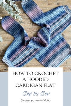 a crocheted scarf with text overlay that reads how to crochet a hooded cardigan flat step by step