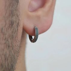 Description: Elevate your style with our Men's Antique Model Steel Hoop Earrings. Crafted from high-quality steel, these earrings feature a 10 mm inner diameter and a 2 mm thickness, ensuring durability and a classic look. Sold individually, they offer a timeless appeal with minimized color change. Perfect for everyday wear, these earrings are resistant to pool and sea water. Product Details: Material: Steel Dimensions: Inner diameter 10 mm, thickness 2 mm Design: Antique model hoop Durability: Minimal Color, Belly Piercing, Sea Water, Men Earrings, Earring Sale, Nose Piercing, Jewelry Earrings Hoops, Elevate Your Style, Classic Looks