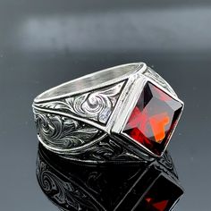 Man Silver Ruby Stone Ring, Engraved Vintage Red Ruby Ring, Men Wedding Ring, Zircon Stone Ring , 925k Sterling Silver Ring , Gift For Him ★Item Details * Gender : Male / Female * Material : 925K Sterling Silver * Total weight : 24 Grams * Gemstone : Ruby  Stone ✔ Ready to Ship in 1-2 Business Days .. ✔ Shipped to the Worldwide 1-5 business days with free shipping... ✔ The product will be sent to you with a handmade wooden box to avoid any damage during shipping... ✔ Visit our store, browse other Men's jewelry, silver and gold collections, and find the perfect piece you're looking for... Click For Our Other Products https://www.etsy.com/shop/MercansilverTR?ref=simple-shop-header-name&listing_id=1003010735 Formal Red Engraved Signet Ring, Formal Red Engraved Ring With Polished Finish, Red Engraved Signet Ring For Formal Occasion, Red Engraved Ring For Formal, Red Engraved Ring For Formal Occasions, Engraved Red Ring For Formal Events, Classic Red Ring With Intricate Design, Red Promise Ring With Intricate Design, Formal Red Hallmarked Engraved Ring