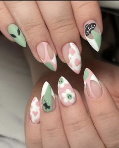 Green and pink alien themed nails. Green Color Block Nails, Grunge Spring Nails, Alternative Spring Nails, Luna Moth Nail Art, Earth Day Nails Design, Cute Alien Nails, Psychadelic Nails Acrylic, Mothman Nails, Earth Day Nails