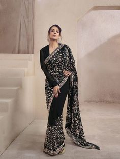 Women Black Floral Multi Thread and Sequins Embroidered Saree with Blouse Piece - Inddus.com Jewellery For Black Saree, Eid Georgette Pre-draped Saree With Intricate Embroidery, Elegant Embroidered Pre-draped Georgette Saree, Elegant Embroidered Georgette Choli, Elegant Embroidered Georgette Blouse Piece, Party Georgette Saree For Transitional Season, Designer Georgette Blouse With Intricate Embroidery, Black Embroidered Pre-draped Saree For Navratri, Black Chanderi Pre-draped Saree For Reception