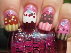 a mani with cupcakes and polka dots on it