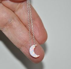 Shop Moon Phase Necklace, Dainty Opal Necklace Sterling Silver, Layering Necklace, Celestial Jewelry, Opal Jewelry, October Birthstone You can wear this necklace with any style/color of your dress. Moon phase necklace is made from: - Lab created white opal moon bead- 11 mm x 8 mm - Diamond cut sparkling sterling silver chain - Sterling silver lobster clasp - Sterling silver jump ring Please select a desired length from the drop down menu. Dainty Opal necklace will make a great gift! Opal is Octo White Moon Charm Jewelry For Party, White Moon Charm Party Jewelry, White Party Jewelry With Moon Charm, Celestial White Opal Jewelry, Celestial Opal Necklace As Gift, Celestial Opal Necklace As A Gift, Celestial Opal Necklace For Gift, Dainty Opal Necklace, Moon Phases Necklace