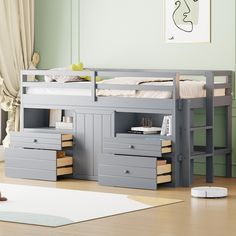 a child's bedroom with a bunk bed and drawers