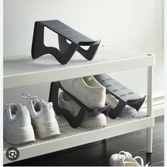 there are several pairs of shoes on the shelf