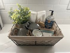 a basket filled with lots of items on top of a counter