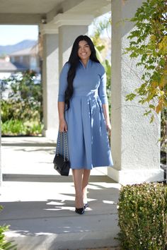 The newest addition to our Pink Label line, our Santorini dress, was an immediate favorite! Made in the most universally flattering cut there is, the Santorini dress features 3/4 sleeves and a beautifully cinched waist skirted in box pleats. A modest but super flattering ""V"" neckline adds a feminine touch and the the Fitted Blue Midi Dress With Pleated Hem, Long Sleeve Gathered Skirt Fall Dress, Long Sleeve Dress With Gathered Skirt For Fall, Modest Spring Dresses With Modesty Panel, Long Sleeve Dress With Gathered Skirt, Spring Ruched Dress With 3/4 Sleeve, Elegant Blue Dress With Gathered Skirt, Modest Pleated Waist Midi Dress For Spring, Modest Pleated Midi Dress