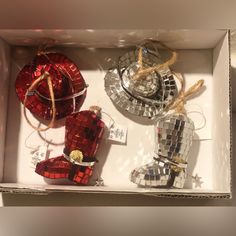 a box filled with disco balls and other decorations