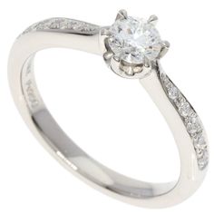 Used Celine Diamond Ring, Platinum Pt950, Women's (Sku: Gzl131im) === General === Brand : Celine === Design === Type : Engagement Ring Gender : Women Material : Platinum 950 Stone : Diamond Weight (Ct.) : 0.305 === Size === Other Size : 7.5 Weight : 4.2g / 0.14oz. === Included Items === Accessories : Diamond Grading Report Accessories Notice : Before Purchasing, Please Refer To The Images Of The Accessories Included With The Item. === Condition === Condition : Used (Very Good) Ranking : Rank A U Celine Ring, Celine Jewelry, Diamond Ring Platinum, Celine Model, Silver Material, Woman Colour, Luxury Branding, Diamond Ring, Platinum