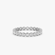 white gold eternity ring Channel Set Stackable Round Rings, Timeless White Gold Stackable Rings With Bezel Setting, White Gold Stackable Rings With Bezel Setting, Timeless Silver Stackable Rings With Bezel Setting, Platinum Bezel Setting Ring, Diamond White Stackable Rings With Bezel Setting, Anniversary Diamond Ring With Smooth Bezel, Timeless Stackable Round Diamond Ring, Timeless Round Stackable Diamond Ring