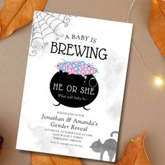 a baby is brewing its or she announcement card with leaves and spider web in the background