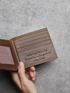 "Personalized with a name and a message of your choice, this wallet will be a perfect sentimental gift for your loved one. The message engraved on the inside could be up to 24 words and you can choose the style for the outside engraving according to your name. P R O D U C T ∙ I N F O * Material: Genuine cowhide leather * Dimensions: 4 3/8\" x 3 1/2\" x 5/8\" (11x9x1.5 cm) * Features: - 1 money slot - 5 card slots - 2 hidden slots H O W ∙ T O ∙ P E R S O N A L I Z E STEP 1: Choose the engraving o Wedding Gifts From Bride, Custom Wallets, Handwriting Samples, Father Of The Bride Gift, Wallet Insert Card, Aluminum Wallet, Custom Wallet, Boyfriend Photos, Personalized Wallet