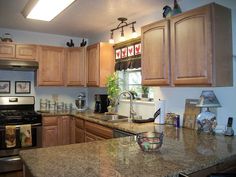 the kitchen is clean and ready for us to use it's granite counter tops