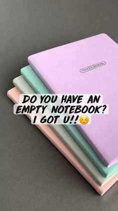 four notebooks stacked on top of each other with the caption do you have an empty notebook? i got u