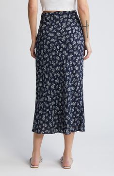 The skirt silhouette of the season is cut to a midi length and ready to top your favorites list. 32" length (size Medium) Lined 100% viscose Machine wash, line dry Imported Black Floral Midi Skirt, Patterned Midi Skirt, Midi Skirt Pattern, Floral Maxi Skirt, Floral Midi Skirt, Favorites List, Shopping List, Midi Length, Favorite Things List