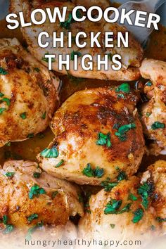 slow cooker chicken thighs with parsley on top and the words slow cooker chicken thighs