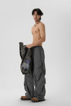 JHYQ parachute pants, pleats throughout, elasticized waistband, zip closure, four-pocket styling, cargo pocket at outseams, bungee-style drawstrings at cuffs. Composition - Cotton Blend Sizing: US/EU Regular Fit Model: 183cm/60kg 6'0/132lbs wearing size XL Functional Full-length Parachute Pants For Outdoor, High-waisted Parachute Pants With Multiple Pockets For Streetwear, Streetwear Full-length Parachute Pants With Multiple Pockets, Cotton Full-length Parachute Pants With Pockets, Functional Pockets Full-length Parachute Pants For Streetwear, Sweater Gift, Short Shirts, Summer Sale, Jeans Pants