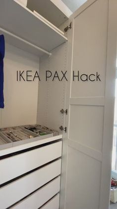 an ikea pax hack in the corner of a room with white cabinets and drawers