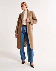 Our new topcoat in a soft wool-blend fabric and tailored-fit silhouette, featuring a long-length, classic lapel collar, luxe interior lining, button front closure and side pockets. Camel Outfit, Simple Winter Outfits, Double Breasted Overcoat, Tailored Coat, Double Breasted Trench Coat, Wrap Coat, Women's Coats & Jackets, Minimalist Outfit, Top Coat