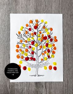 a handmade thanksgiving card with an image of a tree made out of candy balls