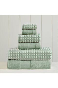 four towels stacked on top of each other