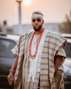 Authentic African AGBADA for men. Do you love wearing fashionable African outfits made of high quality fabrics with top notch tailoring? If yes, kindly place your orders for this AGBADA. We do for individuals, groups, couples and even families and cater to both males and females. All outfits are made to order for exact fit per customer wishes. This particular AGBADA is made of ORIGINAL woven traditional ASO OKE which makes it the perfect outfit for your event. The design is available in several Agbada For Men, Man Suit Photo, Agbada Design, Mens Traditional Wear, Groom's Suit, Dashiki For Men, African Suit, African Outfits, Afrikaanse Mode