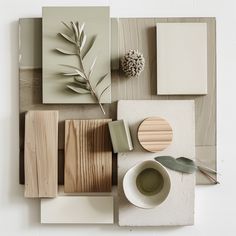 a table topped with lots of different types of wood and tile pieces on top of each other