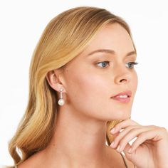 These elegant earrings feature beautiful pearls and twinkling diamonds. The perfect addition to any jewelry collection, these earrings give a luxurious and timeless feel. Pearl And Diamond Earrings, Elegant Earrings, Cultured Pearls, Diamond Earrings, Jewelry Collection, Pearl Earrings, Diamonds, White Gold