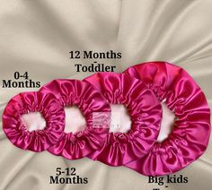 two pink scrunffles are shown with the measurements for each child's head