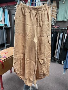 Italian, Linen Pants with button accent at hem, great summer pieces, this pants come in two colors, olive and black, one size fits most, very comfortable and classy. 100% Linen. Linen Pants Style, Summer Pieces, Black Camel, Pants Style, Gucci Black, Linen Pants, Timeless Pieces, Lime Green, Camel