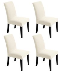 four white dining chairs with black legs