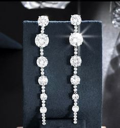 New to our Bella CollectionAnother beauty, glamorous simple, elegant and beautiful long drop swarovski crystal earrings. approx 3 1/2 " long pierced--------------------------------------------(add elegant classic tennis bracelet at discounted price) *Note processing time is not shipping time, our regular Free shipping takes approx. 5-6 days to receive after shipped. With rush processing your order is expedited and you will also be upgraded to priority mail approx 2-3 days to arrive once shipped Elegant Dangle Crystal Earrings, Elegant Crystal Dangle Earrings, Long Drop Crystal Chandelier Earrings, Crystal Long Drop Chandelier Earrings, Elegant Long Drop Chandelier Earrings With Sparkling Stones, Crystal Linear Long Drop Earrings For Party, Crystal Long Drop Linear Earrings, Elegant Dangle Linear Crystal Earrings, Elegant Sparkling Long Drop Chandelier Earrings