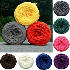 several colors of yarn sitting on top of each other