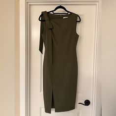 So Flattering And Brand New!!! Love The Over The Should Tie Detail On The Shoulder And The Slit At The Knee To Mid Thigh. So Sad It Doesn’t Fit Me Anymore!! Green Sheath Dress, New Love, Womens Calvin Klein, Sheath Dress, The Knee, Olive Green, Calvin Klein, Midi Dress, Size 6