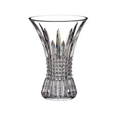 a clear glass vase sitting on top of a table