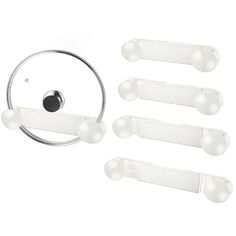 a set of four white plastic door handles