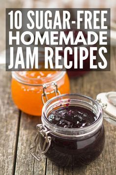 jars filled with jam sitting on top of a wooden table