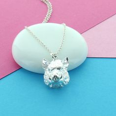 A detailed sterling silver Boar's head charm necklaceThe detailed three dimensional sterling silver Boars head charm necklace is a great piece that would make a statement with any outfit. It would make a great birthday gift, anniversary or addition to your own jewellery box. Each set arrives in a beautiful gift box with a free gift wrapping service available upon request. Made from Sterling silver Dimensions Chain length 16" or 18" Charm Height 1.8cm Width 1.5cm Boars Head, Silver Gift Wrap, Great Birthday Gifts, Gift Wrapping Services, Silver Gifts, Beautiful Gift Boxes, Charm Jewelry, Free Gift, Three Dimensional